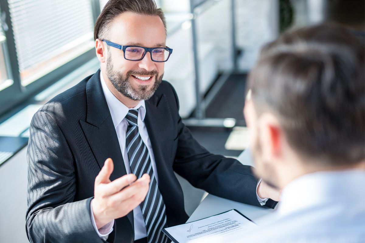 A commercial insurance broker meeting with a business client